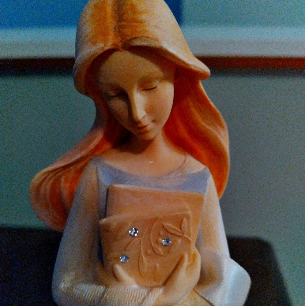 This is  beautiful Teacher figurine